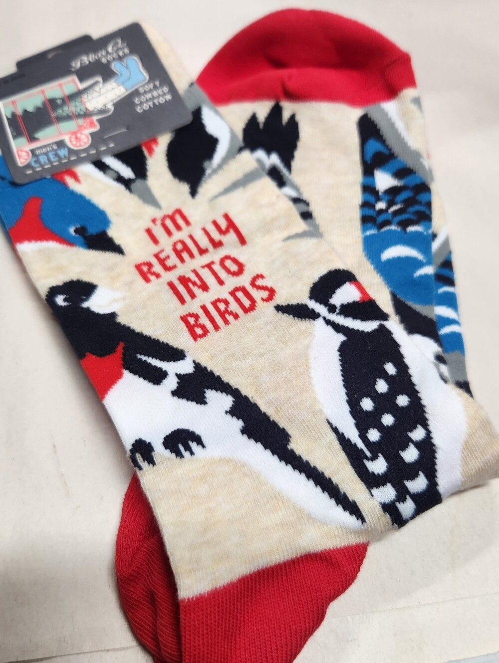 Blue Q Im Really Into Birds Socks with Red Accents and Multicolored Bird Design